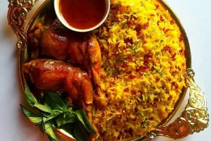 با این روش یک زرشک پلو با مرغ مجلسی و پرخاصیت و مفید بپزید