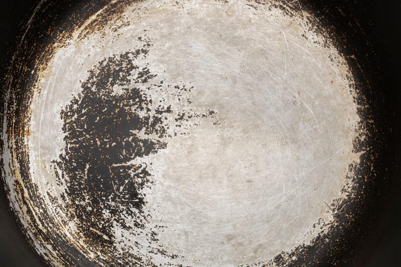 Old scratched non-stick saucepan.